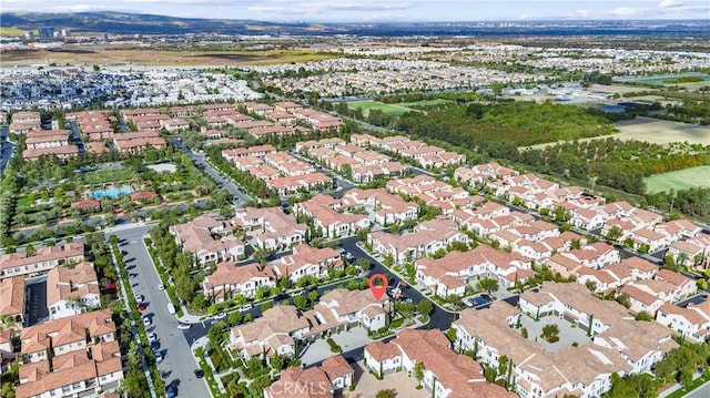 aerial overview of property's location with nearby suburban area