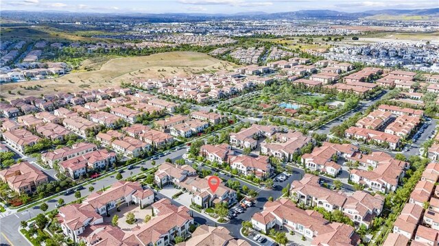 aerial view of property's location with nearby suburban area