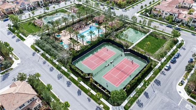 aerial view of residential area featuring a pool
