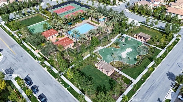 view of property location with a pool