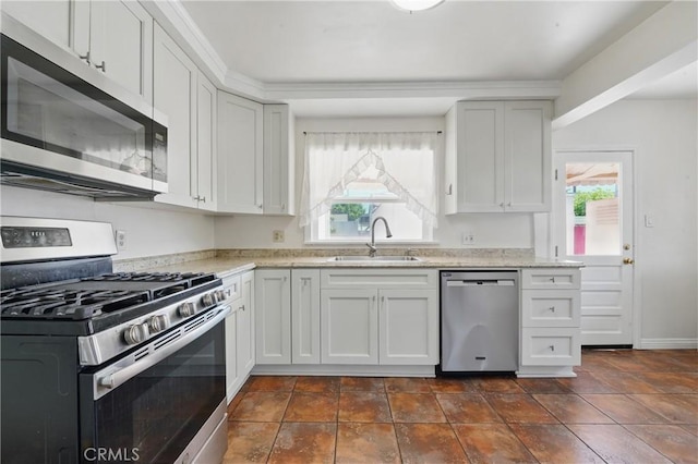 832 S 7th St, Alhambra, CA 91801 - kitchen with stainless steel appliances, a sink, light stone countertops, and white cabinetry