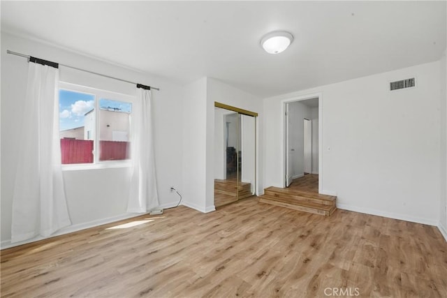 832 S 7th St, Alhambra, CA 91801 - empty room with light wood-style flooring and baseboards
