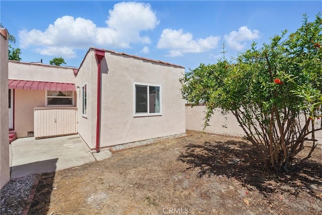 832 S 7th St, Alhambra, CA 91801 - view of property exterior with a fenced backyard, stucco siding, and a patio area