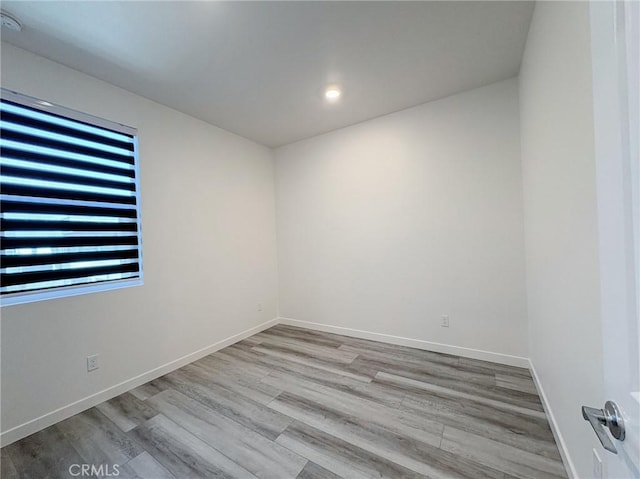3661 S Allston Paseo Unit 7, Ontario, CA 91761 - spare room featuring wood finished floors, baseboards, and recessed lighting