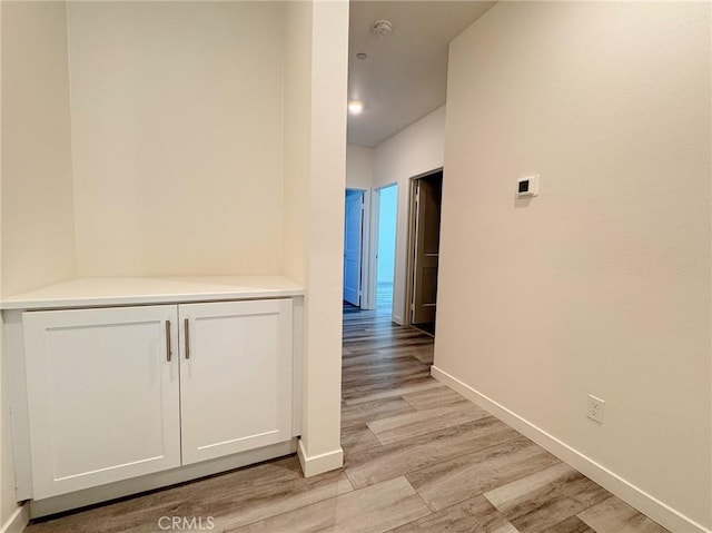 3661 S Allston Paseo Unit 7, Ontario, CA 91761 - hall featuring light wood-style flooring and baseboards