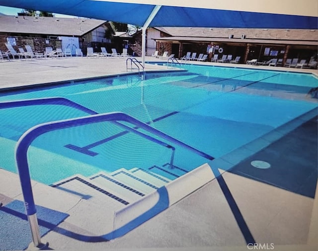 25813 Sandy Lodge Rd, Menifee, CA 92586 - community pool featuring a patio