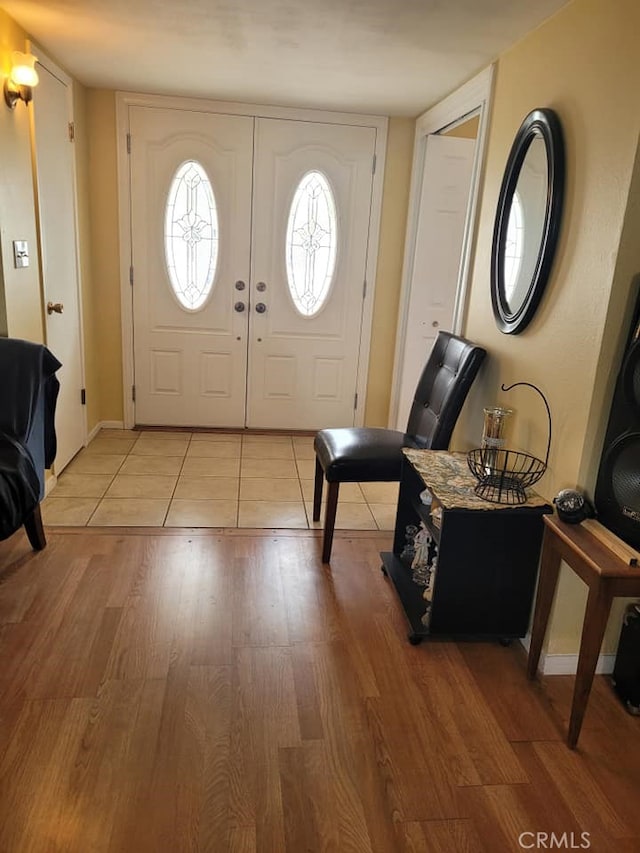 25813 Sandy Lodge Rd, Menifee, CA 92586 - foyer with light wood-type flooring and baseboards