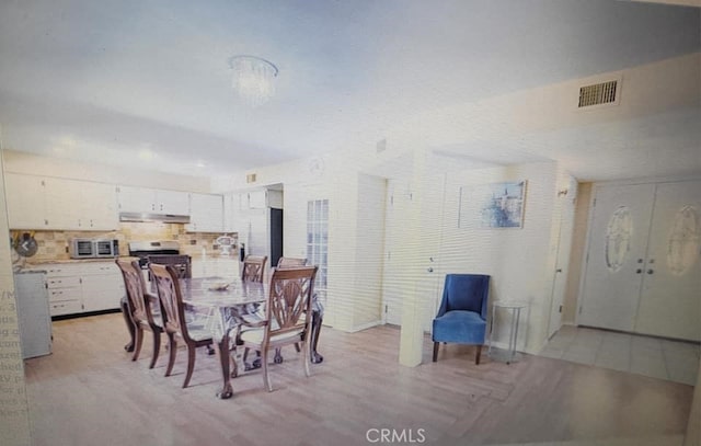 25813 Sandy Lodge Rd, Menifee, CA 92586 - dining space with light wood finished floors