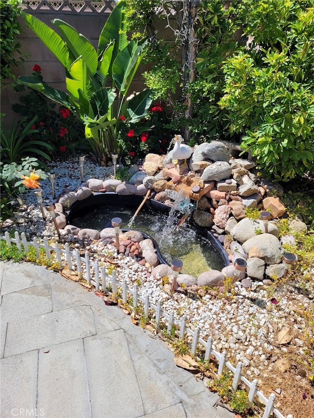 25813 Sandy Lodge Rd, Menifee, CA 92586 - exterior view of a garden pond