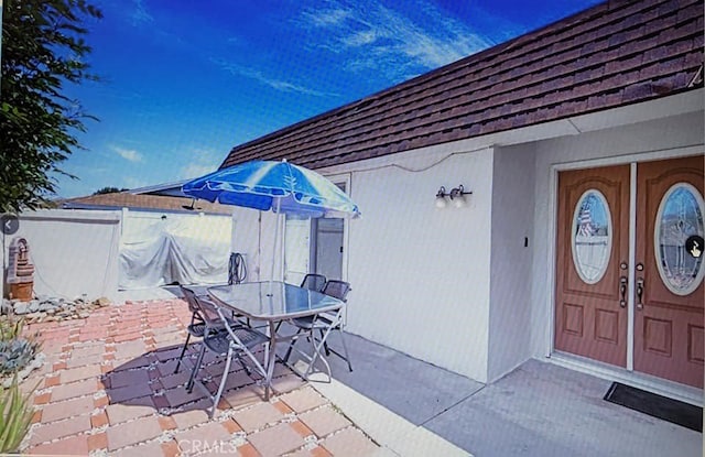 25813 Sandy Lodge Rd, Menifee, CA 92586 - view of patio with outdoor dining space and fence