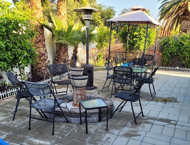 25813 Sandy Lodge Rd, Menifee, CA 92586 - view of patio with a gazebo, a fenced backyard, and outdoor dining space