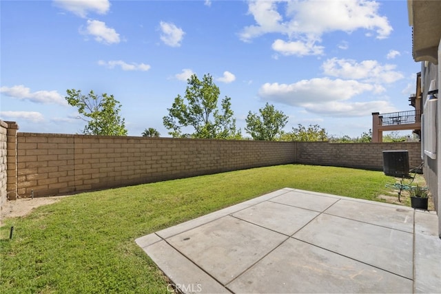 2455 Delicious Ln, Palmdale, CA 93551 - view of yard featuring central air condition unit and a patio