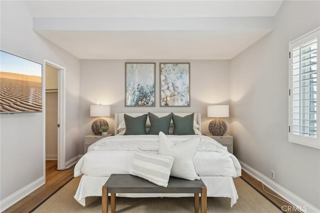 1304 12th St Unit B, Manhattan Beach, CA 90266 - bedroom featuring baseboards, multiple windows, and wood finished floors