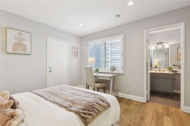 1304 12th St Unit B, Manhattan Beach, CA 90266 - bedroom featuring light wood-type flooring, baseboards, recessed lighting, and ensuite bath