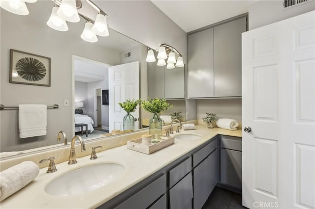 1304 12th St Unit B, Manhattan Beach, CA 90266 - ensuite bathroom featuring double vanity and tile patterned flooring