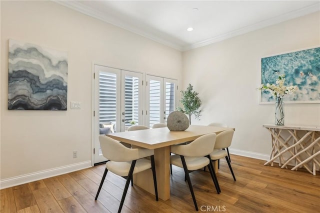 1304 12th St Unit B, Manhattan Beach, CA 90266 - dining area featuring ornamental molding, hardwood / wood-style flooring, baseboards, and recessed lighting