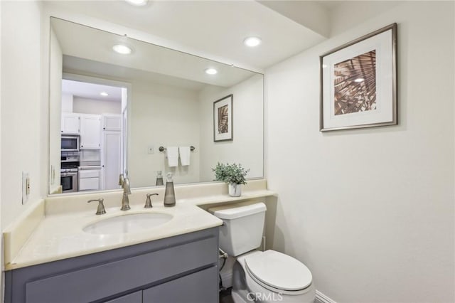 1304 12th St Unit B, Manhattan Beach, CA 90266 - bathroom with recessed lighting, toilet, and vanity