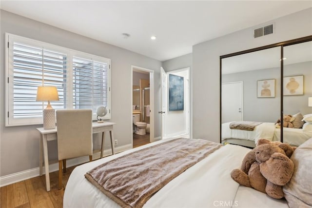 1304 12th St Unit B, Manhattan Beach, CA 90266 - bedroom with wood finished floors, baseboards, a closet, recessed lighting, and ensuite bath
