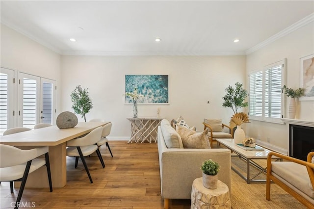 1304 12th St Unit B, Manhattan Beach, CA 90266 - living area featuring light wood-style floors, crown molding, recessed lighting, and baseboards