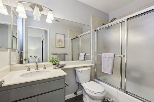 1304 12th St Unit B, Manhattan Beach, CA 90266 - bathroom featuring vanity, toilet, and enclosed tub / shower combo