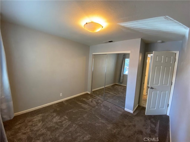 1114 Nord Ave Unit 11, Chico, CA 95926 - unfurnished bedroom with carpet flooring, a closet, and baseboards