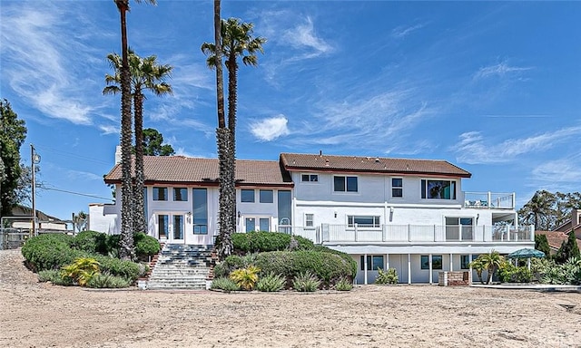 425 Calle Cielo, Nipomo, CA 93444 - back of house with a tiled roof, a balcony, stairway, french doors, and stucco siding