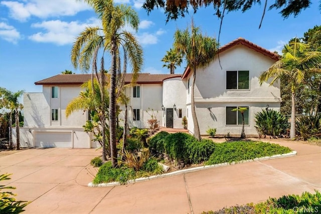 425 Calle Cielo, Nipomo, CA 93444 - mediterranean / spanish-style house with an attached garage, stucco siding, and driveway