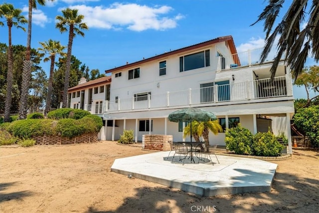 425 Calle Cielo, Nipomo, CA 93444 - back of property featuring a balcony, a patio area, and stucco siding