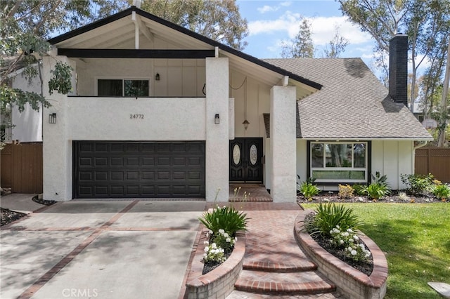 24772 Eldamar Ave, Lake Forest, CA 92630 - view of front of property featuring a chimney, driveway, a garage, board and batten siding, and roof with shingles