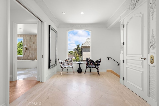 530 Kings Rd, Newport Beach, CA 92663 - sitting room with light tile patterned floors, crown molding, baseboards, and recessed lighting