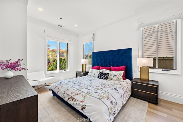 530 Kings Rd, Newport Beach, CA 92663 - bedroom featuring wood finished floors, crown molding, recessed lighting, and baseboards
