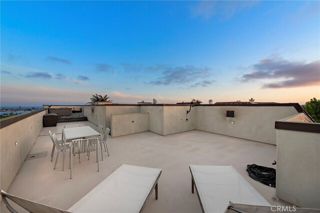 530 Kings Rd, Newport Beach, CA 92663 - patio terrace at dusk featuring a patio area and outdoor dining space