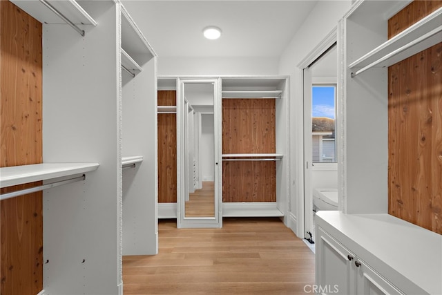 530 Kings Rd, Newport Beach, CA 92663 - spacious closet featuring light wood finished floors