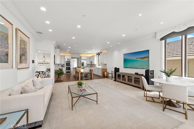 530 Kings Rd, Newport Beach, CA 92663 - living room with recessed lighting and ornamental molding
