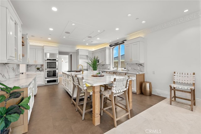 530 Kings Rd, Newport Beach, CA 92663 - tiled dining area with recessed lighting, a sink, and ornamental molding
