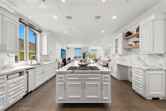 530 Kings Rd, Newport Beach, CA 92663 - kitchen with stainless steel gas stovetop, recessed lighting, a sink, white cabinetry, and tasteful backsplash