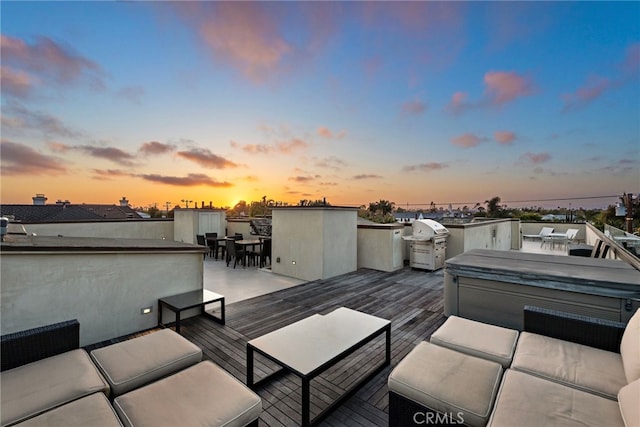 530 Kings Rd, Newport Beach, CA 92663 - deck at dusk with an outdoor living space and grilling area