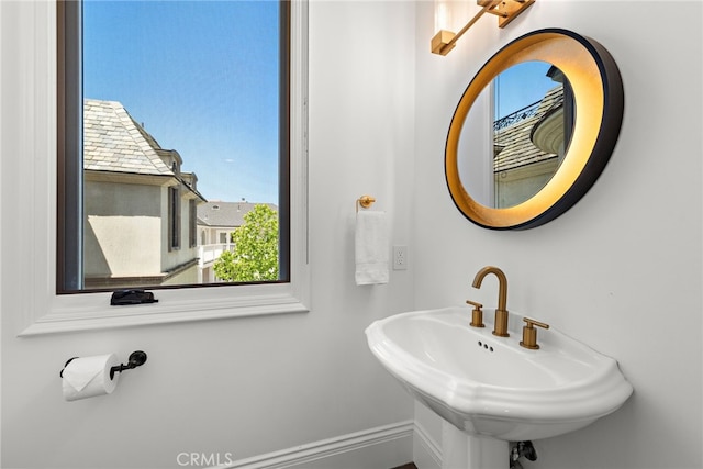 530 Kings Rd, Newport Beach, CA 92663 - bathroom with a sink and baseboards