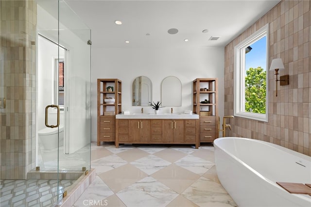 530 Kings Rd, Newport Beach, CA 92663 - full bath featuring double vanity, a shower stall, a freestanding tub, recessed lighting, and tile walls