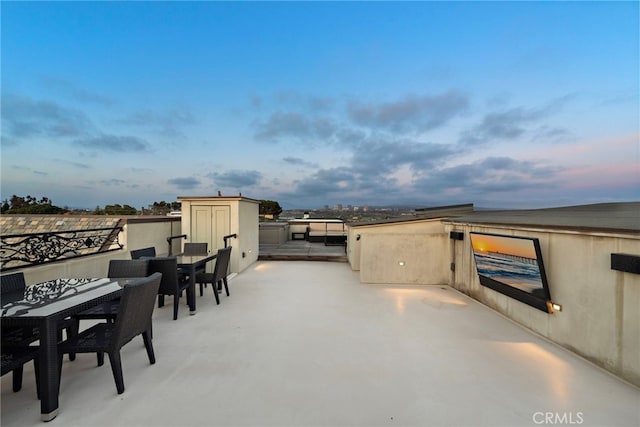 530 Kings Rd, Newport Beach, CA 92663 - patio terrace at dusk with outdoor dining area and a patio
