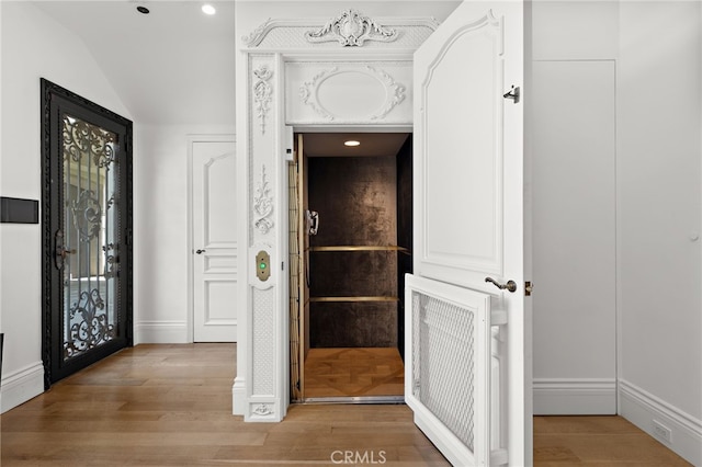 530 Kings Rd, Newport Beach, CA 92663 - entrance foyer featuring vaulted ceiling, light wood finished floors, baseboards, and recessed lighting