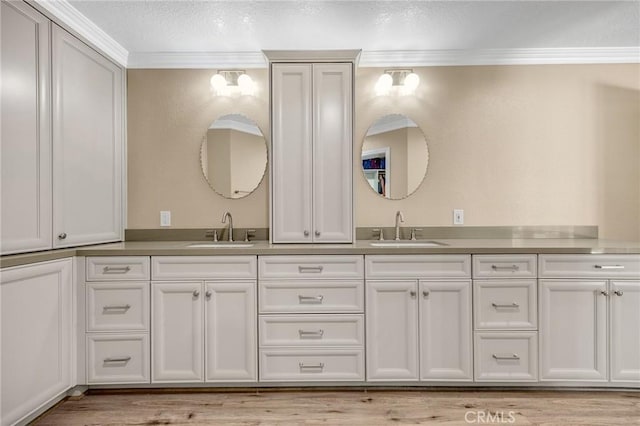 1412 Alta Mesa Way, Brea, CA 92821 - full bath with ornamental molding, double vanity, wood finished floors, and a textured ceiling
