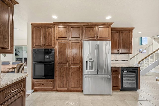 1412 Alta Mesa Way, Brea, CA 92821 - kitchen featuring high end fridge, wine cooler, backsplash, light stone counters, and recessed lighting