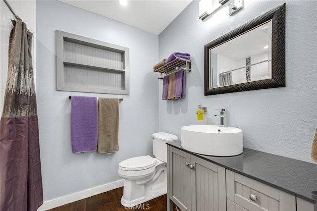 1412 Alta Mesa Way, Brea, CA 92821 - bathroom featuring wood finished floors, toilet, baseboards, vanity, and curtained shower