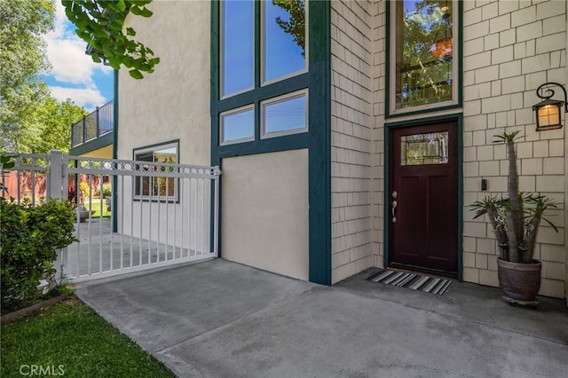 1412 Alta Mesa Way, Brea, CA 92821 - property entrance featuring a gate, stucco siding, and fence