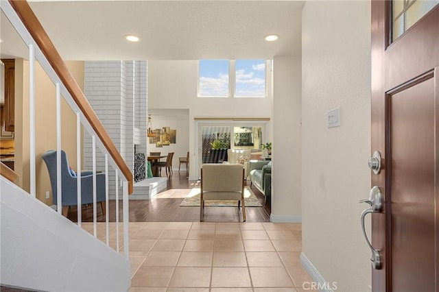 1412 Alta Mesa Way, Brea, CA 92821 - foyer with recessed lighting, stairway, baseboards, a towering ceiling, and light tile patterned floors