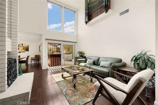 1412 Alta Mesa Way, Brea, CA 92821 - living room featuring dark wood-style floors, a high ceiling, and baseboards