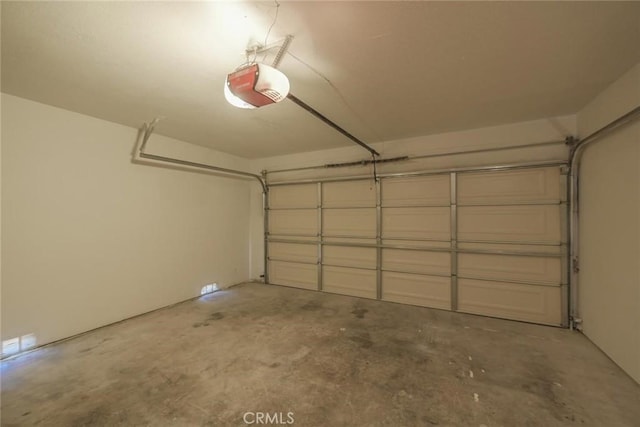 16739 Mission St, Hesperia, CA 92345 - garage featuring a garage door opener