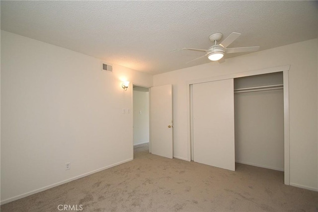 2400 Marshallfield Ln, Redondo Beach, CA 90278 - unfurnished bedroom featuring carpet floors, a closet, a textured ceiling, a ceiling fan, and baseboards
