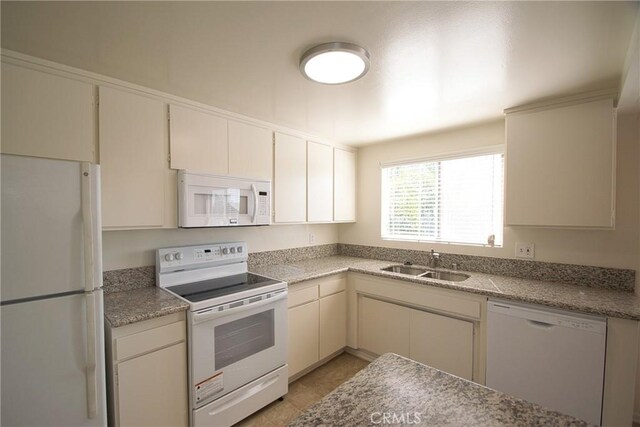 2400 Marshallfield Ln, Redondo Beach, CA 90278 - kitchen featuring white appliances, a sink, and light countertops